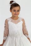 Sukienka dla dziewczynki Nebula 7-11 lat 30025 w kolorze złamanej bieli